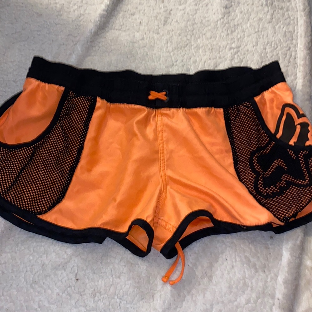 Athletic shorts , buttery soft material , has waist tie and stretchy waist band